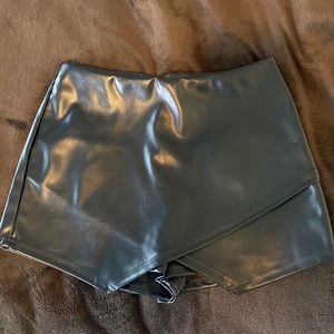 Black leather skort.
